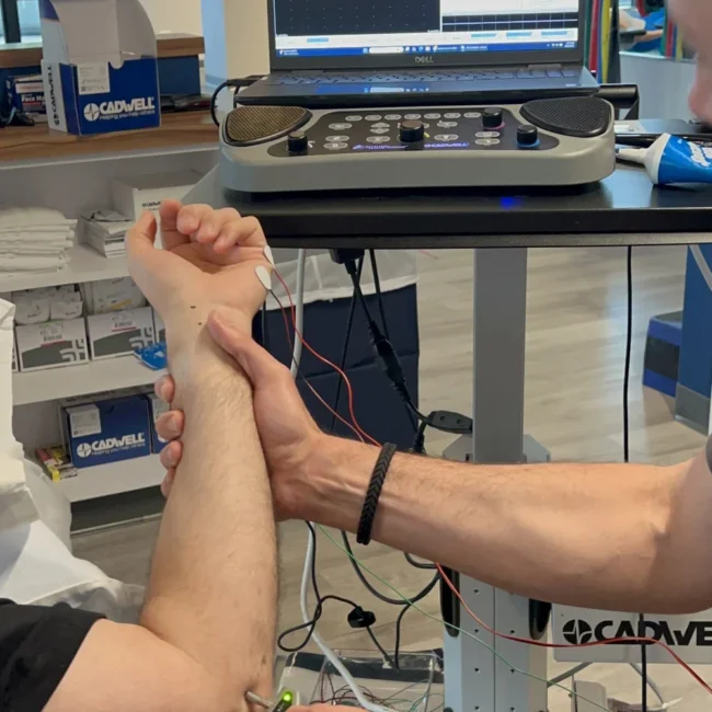 EMG testing on arm with electrode stimulation Chicago